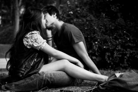Couple of lovers in urban park in Paris Stock Photos