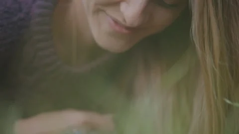 Couple lying down together and smiling outdoors Stock Footage 275269646