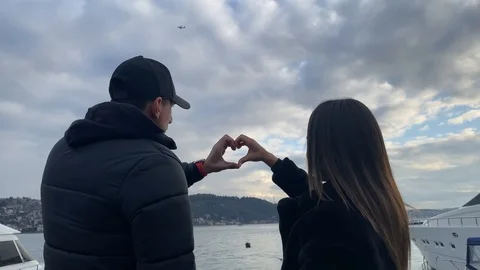 Couple Making Heart With Hands, Symbol of Love and Togetherness in Relations. Stock Footage 123493579