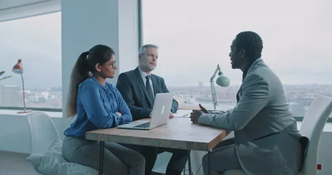 Couple managers looking through CV Stock Footage 208040505