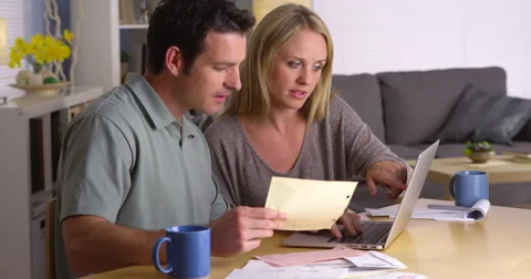 Couple managing their bills Video stock 44480690