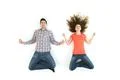 The couple meditate on the white floor. View from above Photo