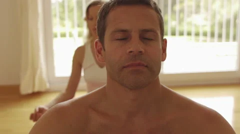 Couple meditating in exercise room. Stock Footage 43657928