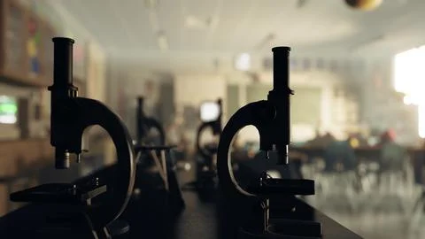 A couple of microscopes sitting on top of a table Stock Illustration