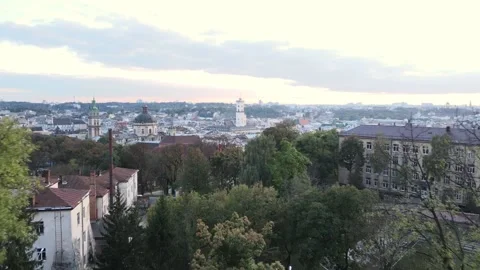 Couple at observation deck looking on sunset above the city Stock Footage 142874583