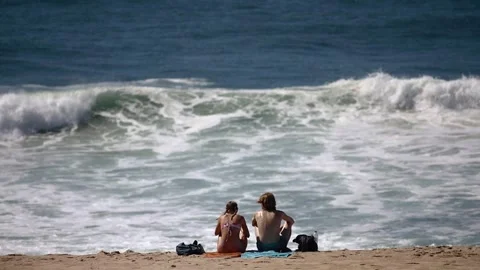 A couple on the ocean Stock Footage 250981648