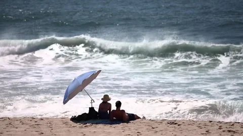 A couple on the ocean Stock Footage 250982542