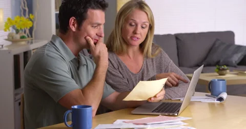 Couple overwhelmed with bills Video stock 44480768