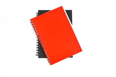 Couple of paper note diary of red and black color placed on top of each other Stock Photos