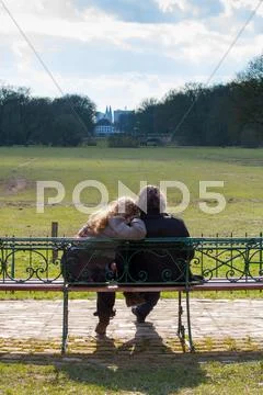 Couple on park bench Stock Photos