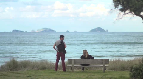 Couple at the park with Ocean view Stock Footage 65627703