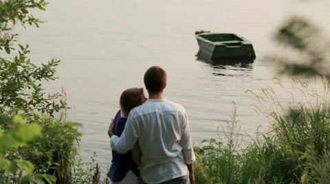 Couple in the park by the river Stock Footage 66183760