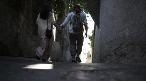 Couple Passing European Street Stock Footage