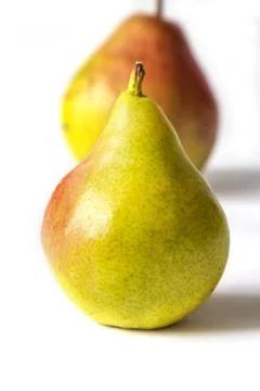 A couple pears on white background. Macro view Stock Photos