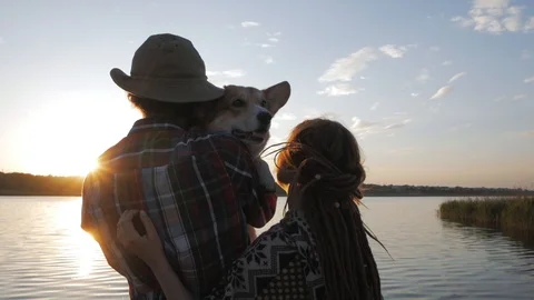 Couple of people with corgi Stock Footage 91602184