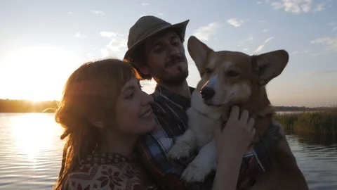 Couple of people with corgi Stock Footage 91602193