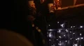 Couple of people drinking hot beverages, communicating at street festival HD Footage