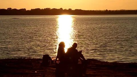 Couple of people on sunset background Stock Footage 78088496