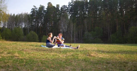 Couple at picnic Stock Footage 38792958