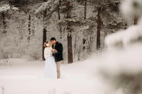 Couple in a pine forest 库存照片