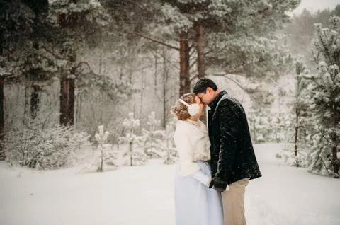 Couple in a pine forest Stock Photos