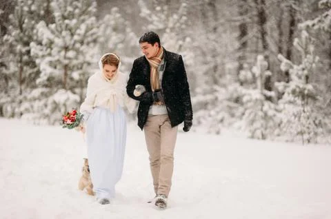 Couple in a pine forest Stock Photos