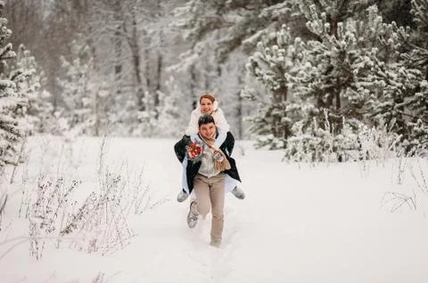Couple in a pine forest Stock Photos