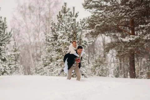 Couple in a pine forest Stock Photos