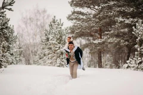 Couple in a pine forest Stock Photos