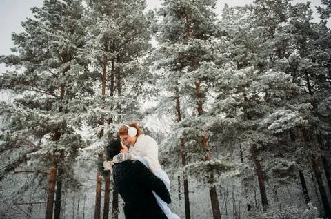 Couple in a pine forest Stock Photos