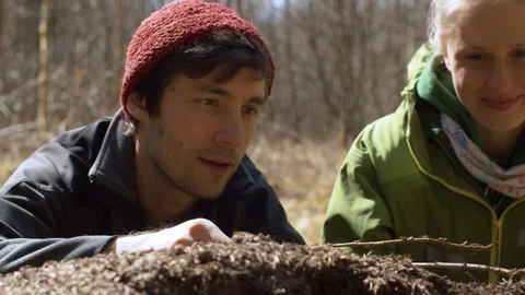 Couple playing with ants Stock Footage 128866888