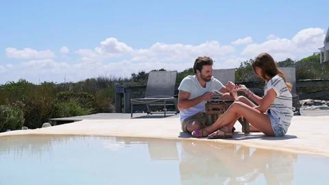 Couple playing backgammon Stock Footage 84011784