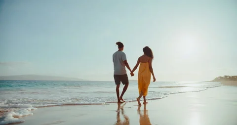 Couple Playing on the Beach at Sunset Stock Footage 196185201