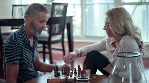 Couple playing chess. Stock Footage 64121572