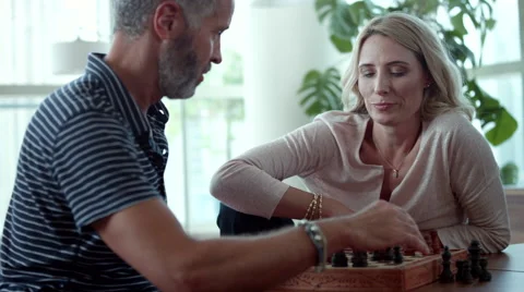 Couple playing chess. Stock Footage 64121862