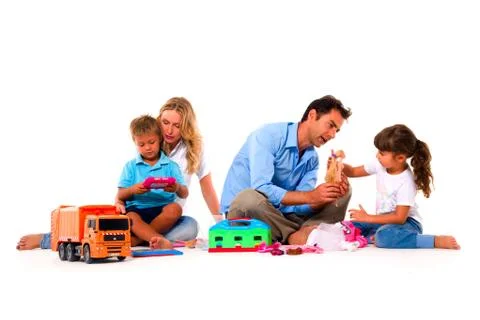 Couple playing with children Stock Photos