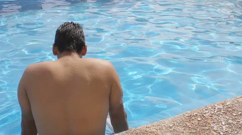 Couple playing in pool Stock Footage 1092345