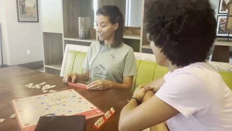 Couple playing scrabble 動画素材 247207727