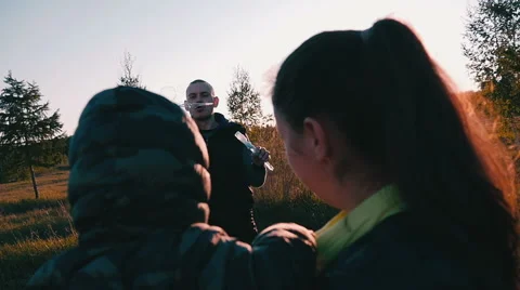 Couple playing with soap bubbles Stock Footage 68461189