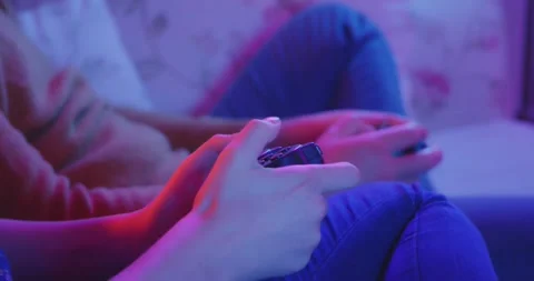 Couple Playing Video Games Console Living Room Colorful Green Screen TV Stock-Footage 195288860