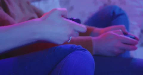Couple Playing Video Games Console Living Room Colorful Green Screen TV Stock-Footage 195288875