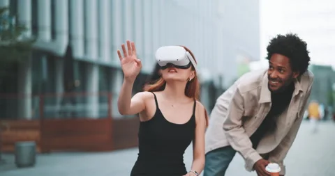 A couple playing with virtual reality in the city Stock Footage 201686755