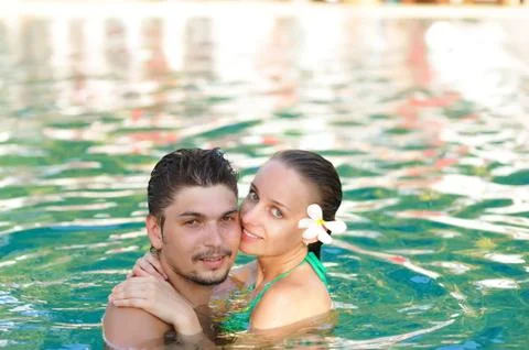 Couple in pool Stock Photos