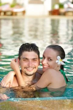 Couple in pool Stock Photos