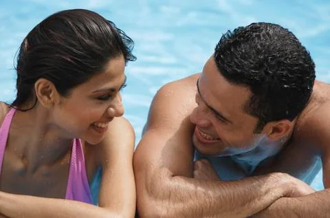 Couple in pool Stock Photos