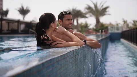 Couple at poolside. Stock Footage 119378701
