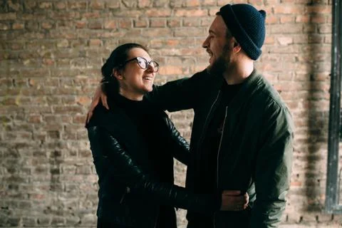 Couple posing in backstreet Stock Photos