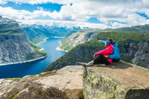 Couple posing on Trolltunga Norway Stock Photos
