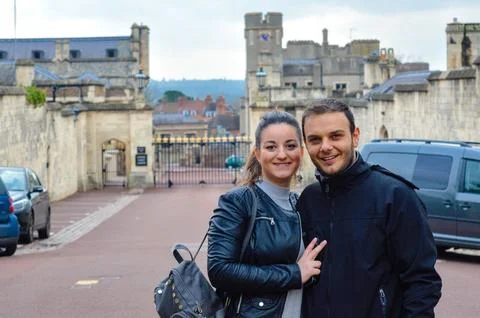 Couple posing at Windsor Castle gates, England Stock Photos