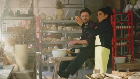 Couple of Potters In Studio Together Stock Footage 169056676